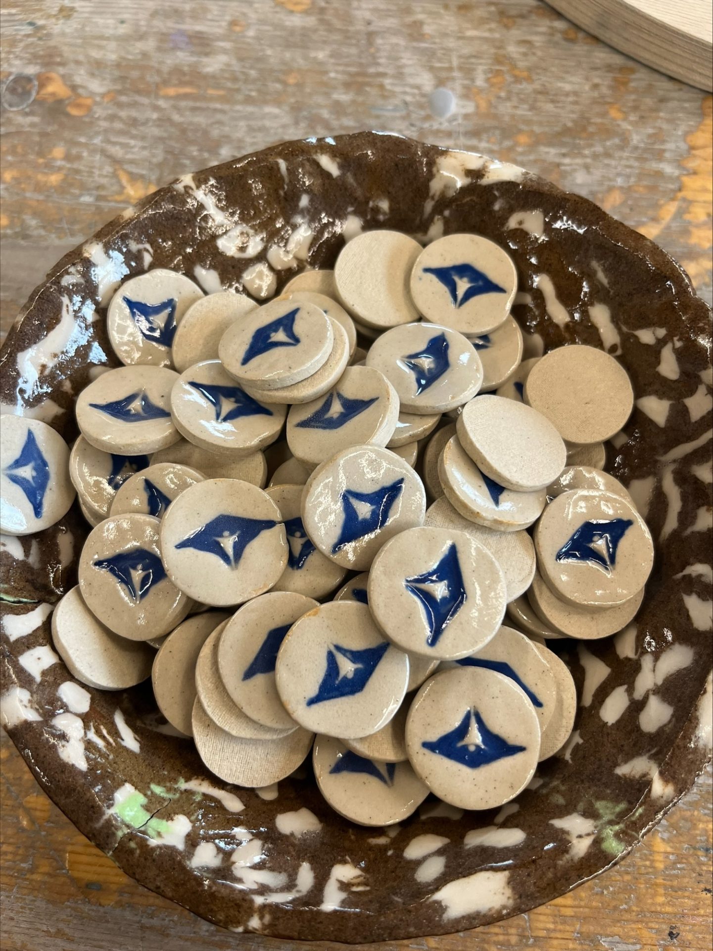 Badges in a Bowl ready for their Backs